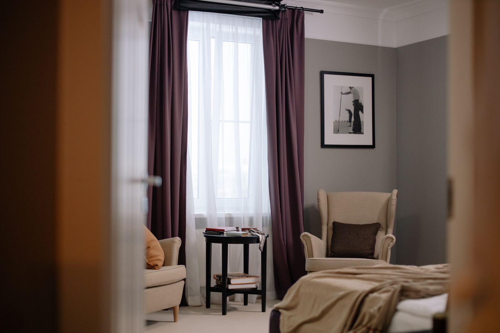 A private consultation room with two armchairs and a window
